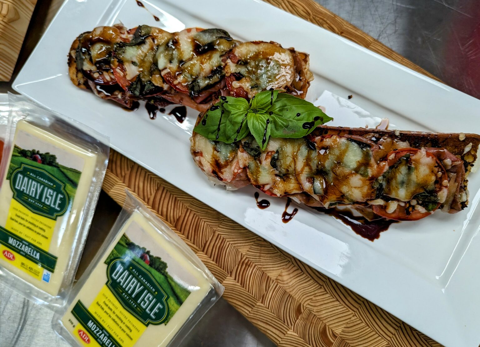 OpenFaced Mozza, Pesto, Prosciutto & Tomato Sandwich Dairy Isle